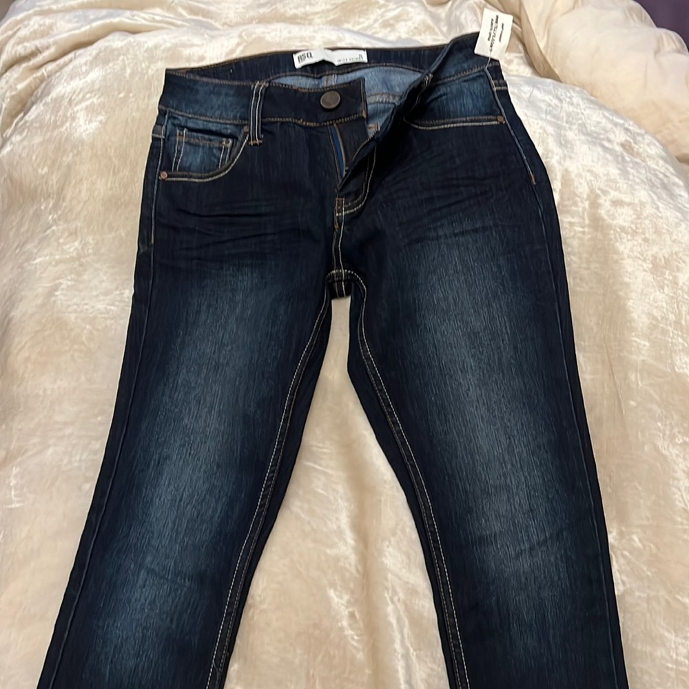 Dark wash jeans. New with tags. Size 5